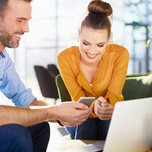 Two people reading reviews